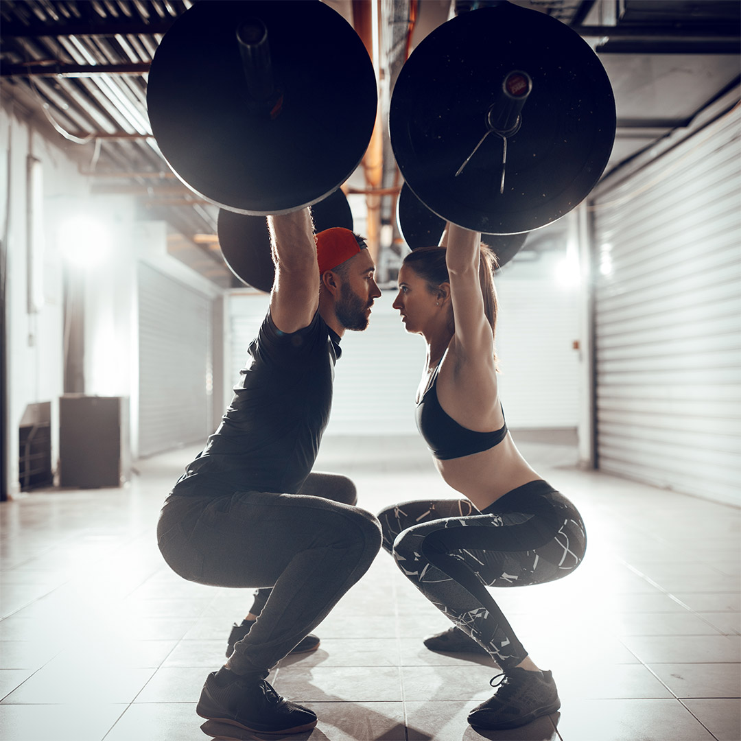 Weightlifting couple. Strength training - one of the more common causes of pelvic venous insufficiency.